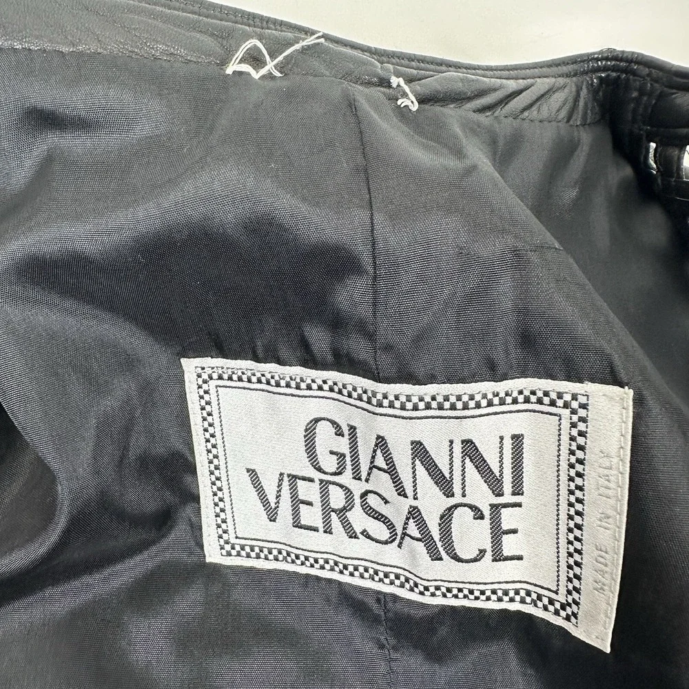 GIANNI VERSACE black leather vest w/ an open lattice feature in front 46